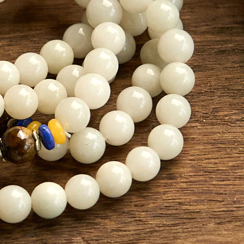 Braccialetto Buddha Stones con 108 perle Mala in quarzite naturale per la ricchezza e la fortuna - Image 12